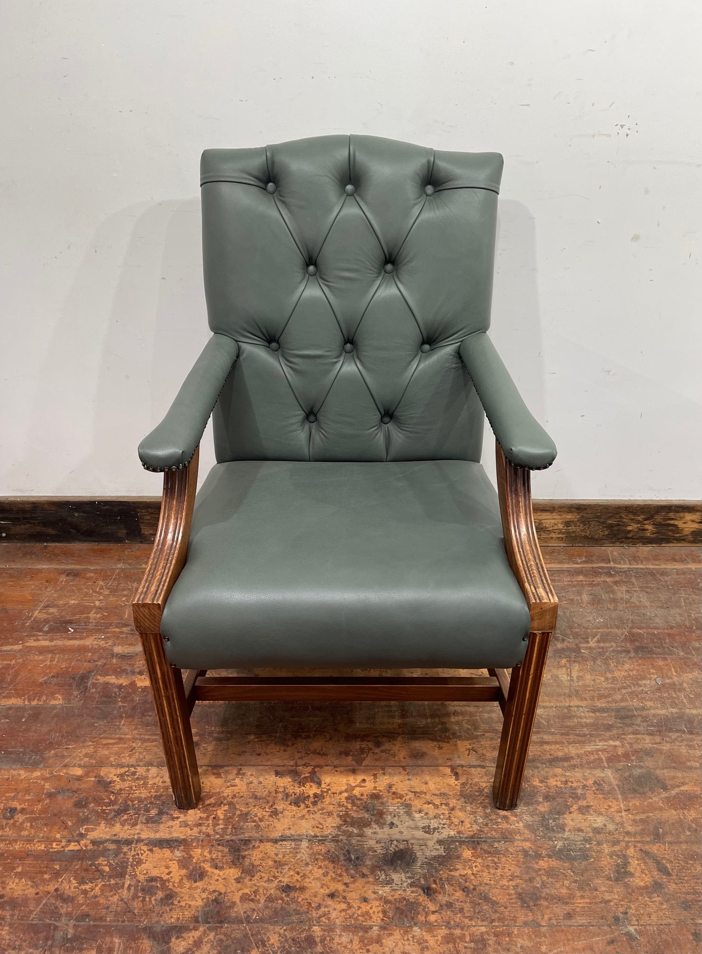 Vintage style armchair in light blue-grey leather