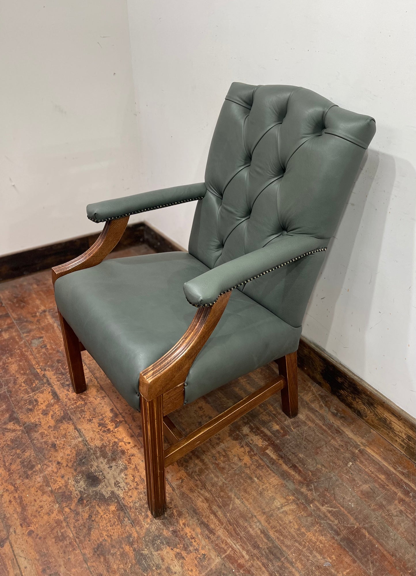 Vintage style armchair in light blue-grey leather