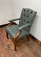 Vintage style armchair in light blue-grey leather