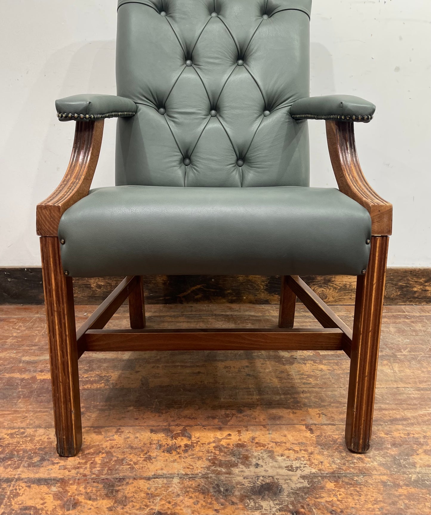 Vintage style armchair in light blue-grey leather