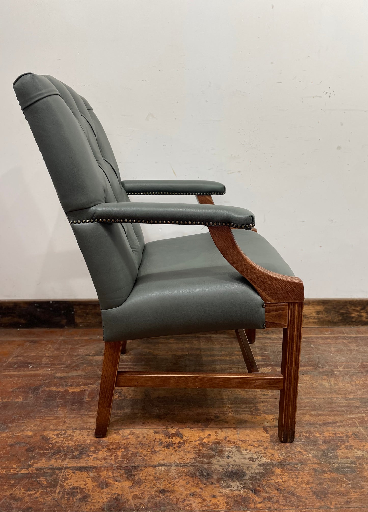 Vintage style armchair in light blue-grey leather