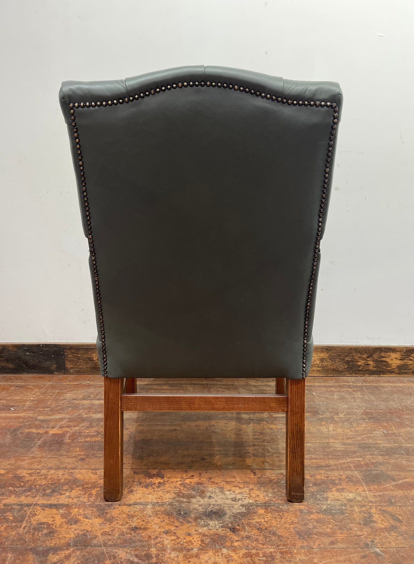 Vintage style armchair in light blue-grey leather
