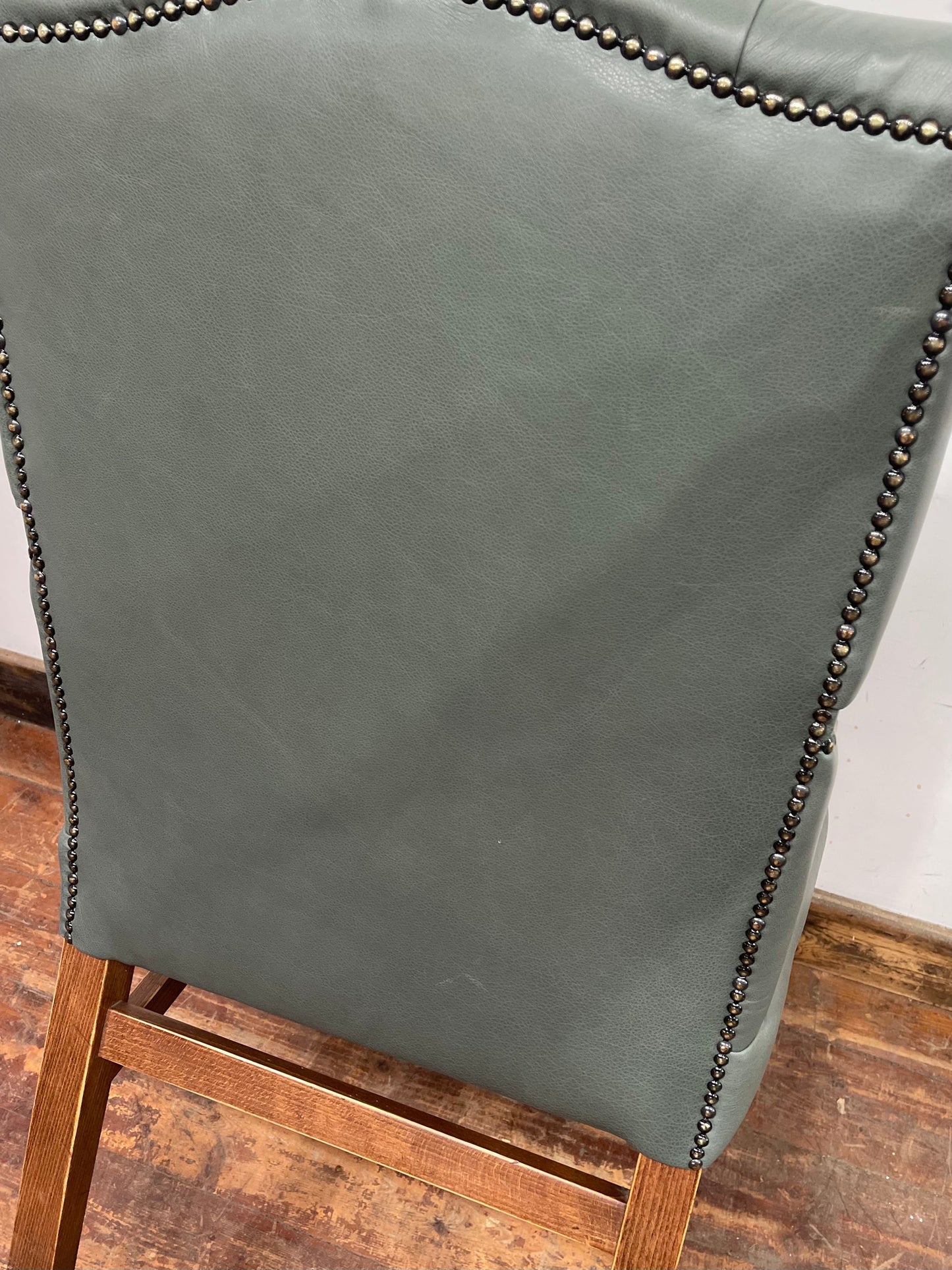 Vintage style armchair in light blue-grey leather