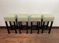 Set of 4 matching bar stools with light fabric seats