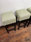 Set of 4 matching bar stools with light fabric seats