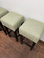 Set of 4 matching bar stools with light fabric seats
