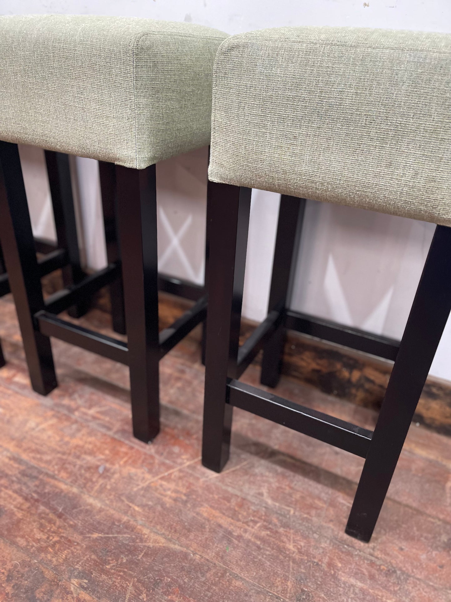 Set of 4 matching bar stools with light fabric seats