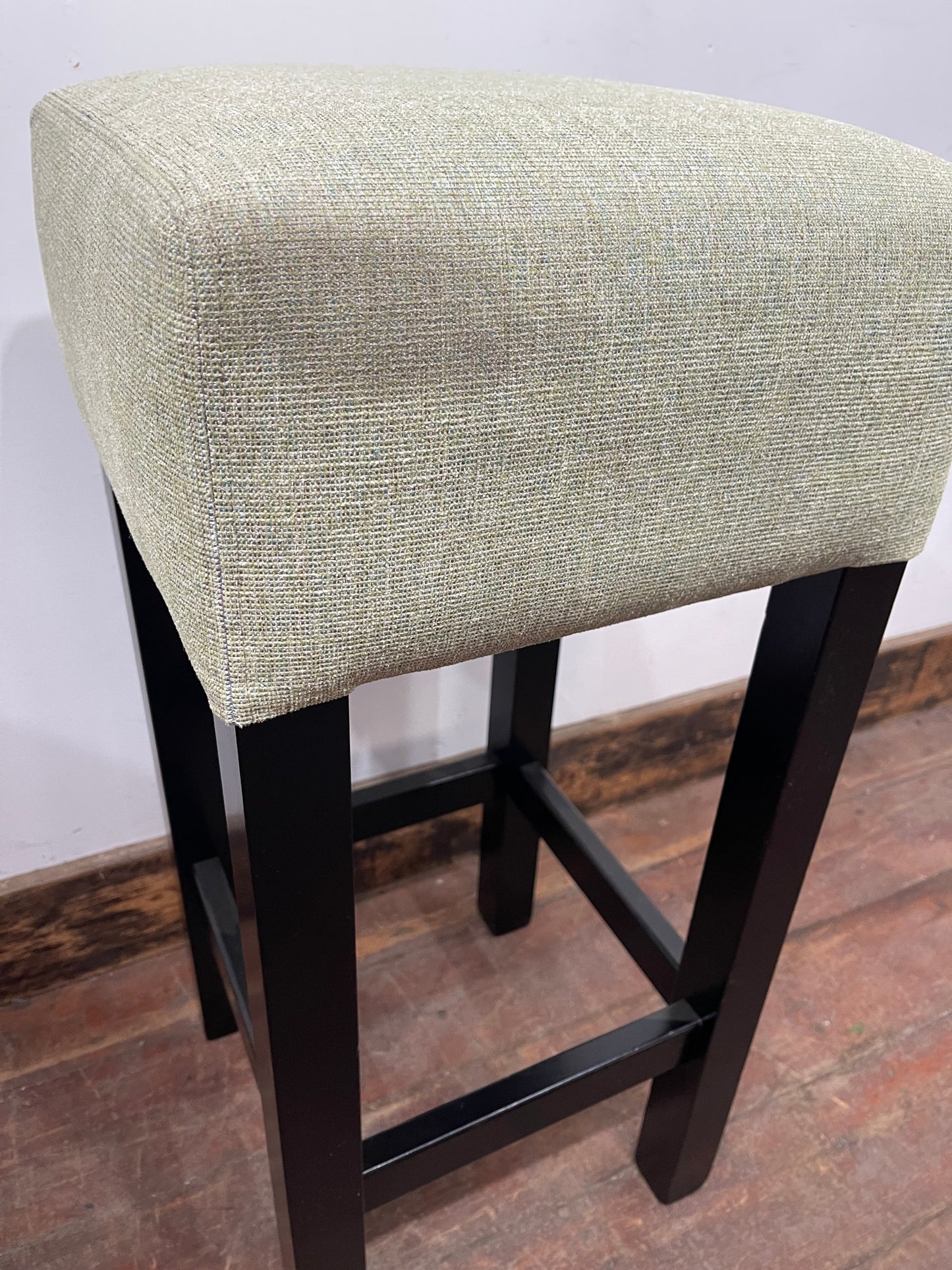 Set of 4 matching bar stools with light fabric seats