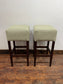 Pair of matching bar stools with light fabric seats