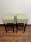 Pair of matching bar stools with light fabric seats
