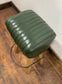 Pommel stool with green leather seat