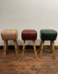 Pommel stool with dark tan / brown leather seat