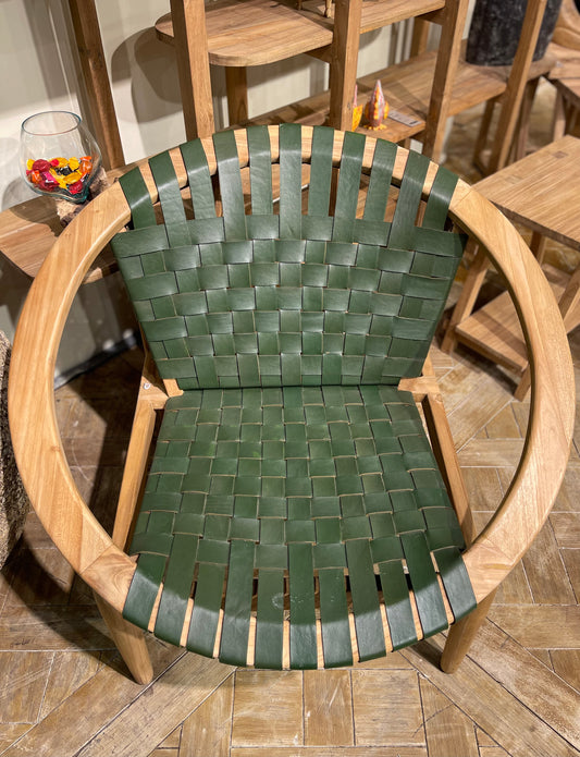 Stylish moon chair with wooden frame and green leather seat