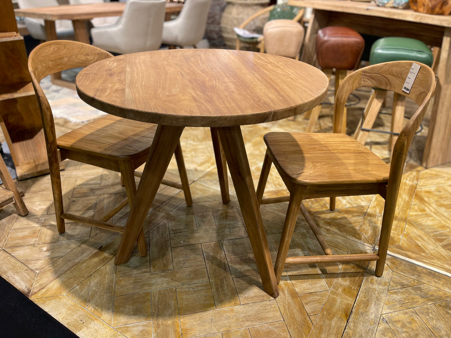 Pair of dining chairs in light wood tone