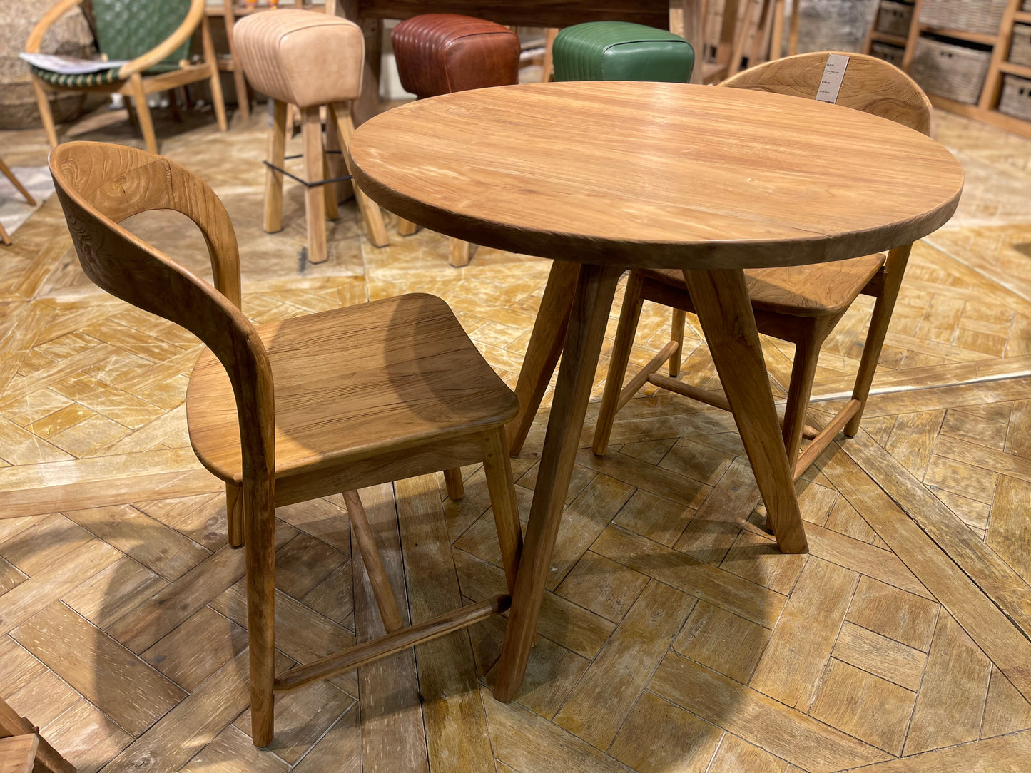 Pair of dining chairs in light wood tone