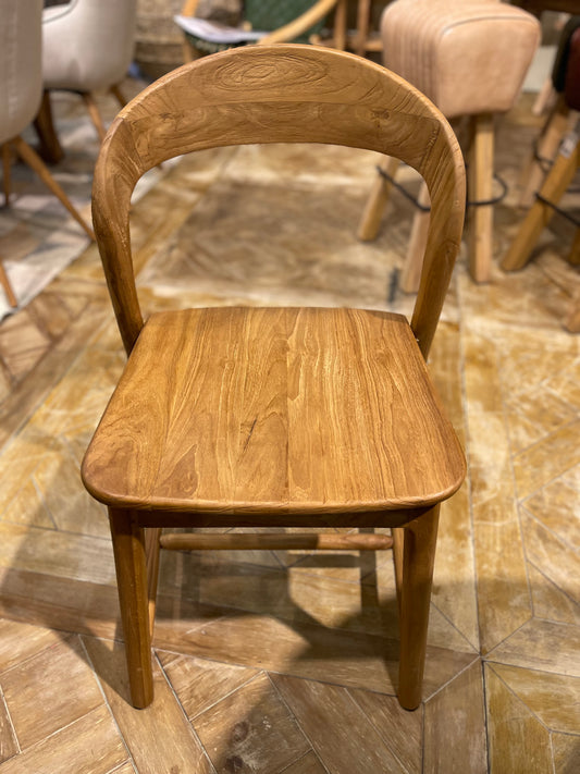 Pair of dining chairs in light wood tone