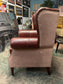 Chestnut brown leather armchair with button back