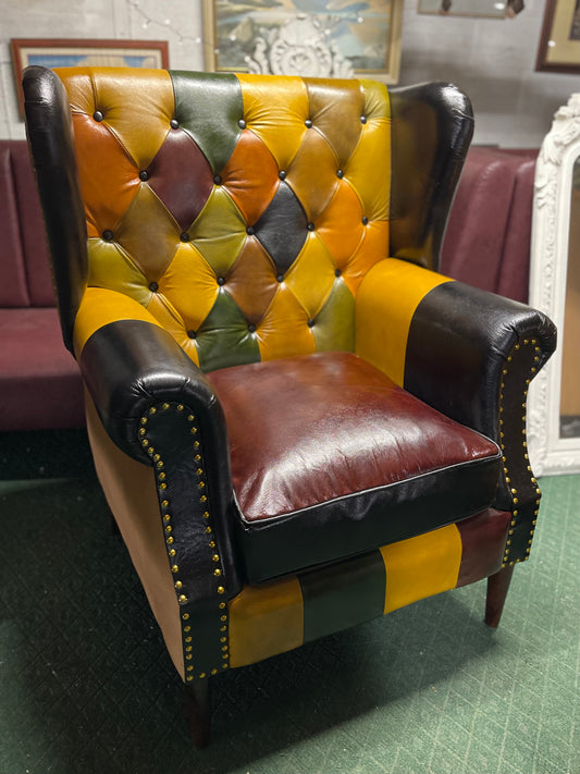 Colourful patchwork leather armchair with button back