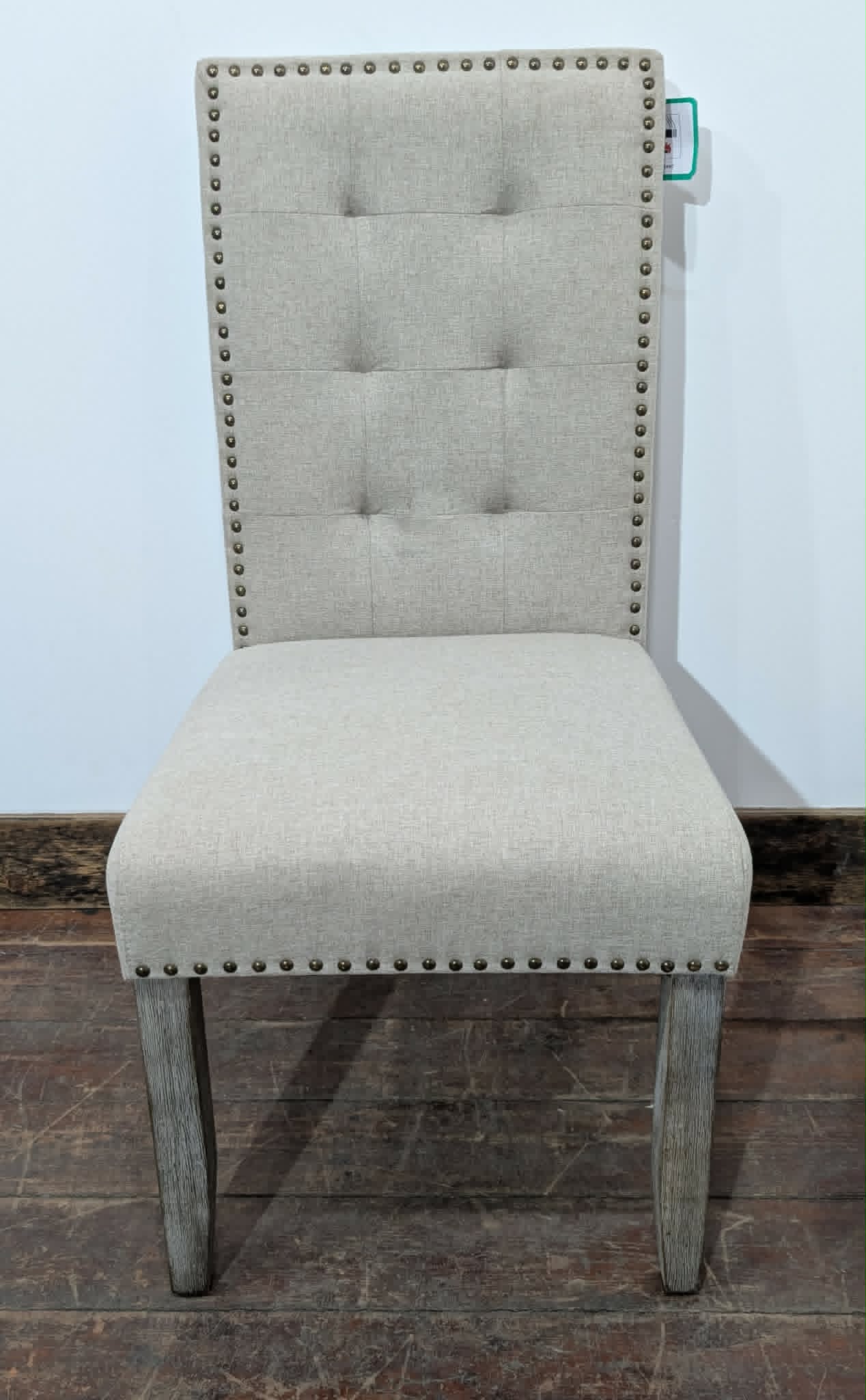 Set of Four Off-White Fabric Upholstered Dining Chairs / Brass Studs