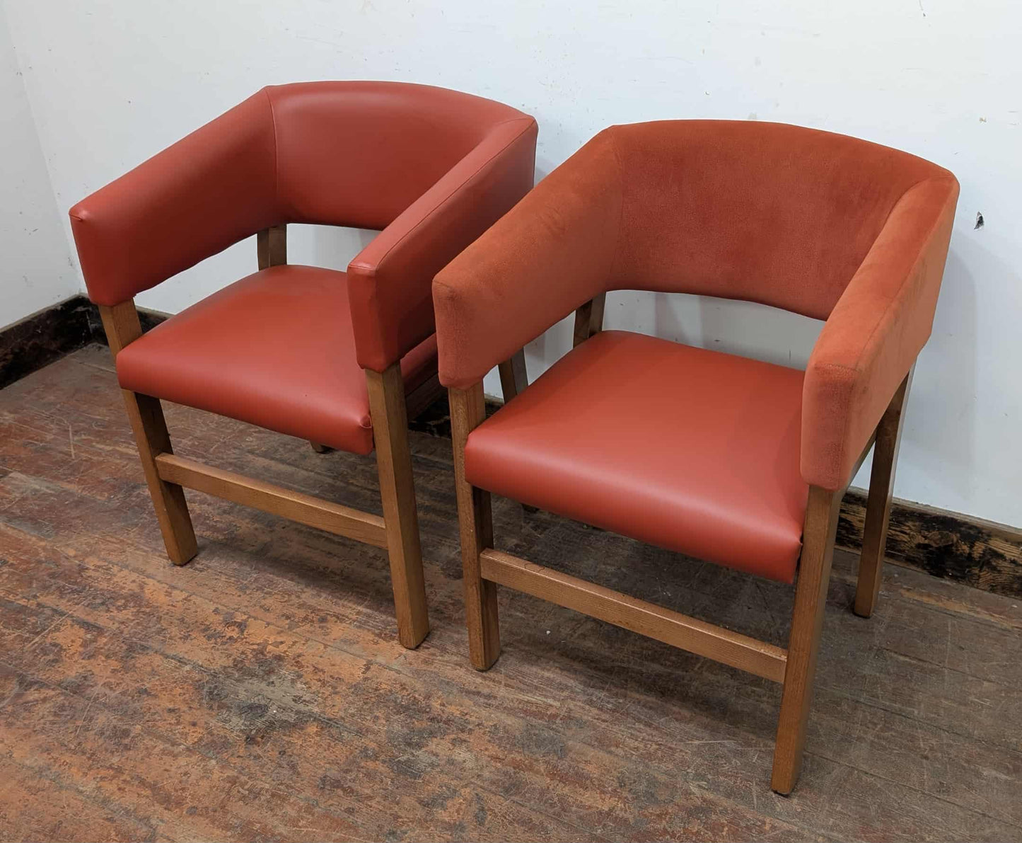 Set of 9 orange faux-leather and fabric tub chairs for cafe / pub / restaurant