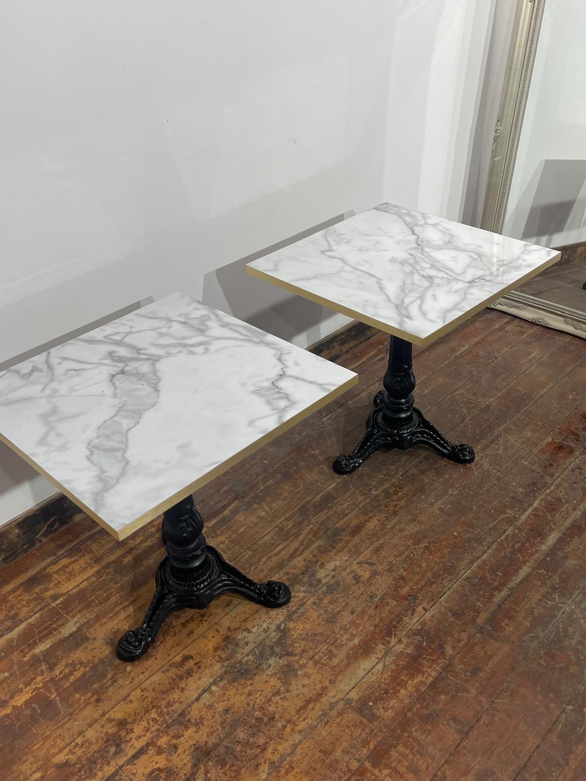 Pair of Marble Effect Bistro Tables with Ornate Black Cast Iron Bases Gold Trim