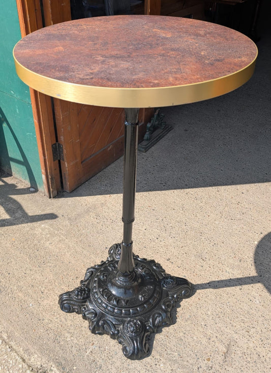 Brown and Gold Topped Poseur Table with Cast Iron Base