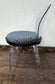 Set of Four Clear Plastic Spoonback Chairs with Blue Spotted Upholstered Seats