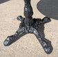 Carved Round Pub Table with Antique Wooden Top and Cast Iron Base