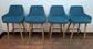 Set of 4 teal suede-like fabric bar stools for cafe / pub / restaurant